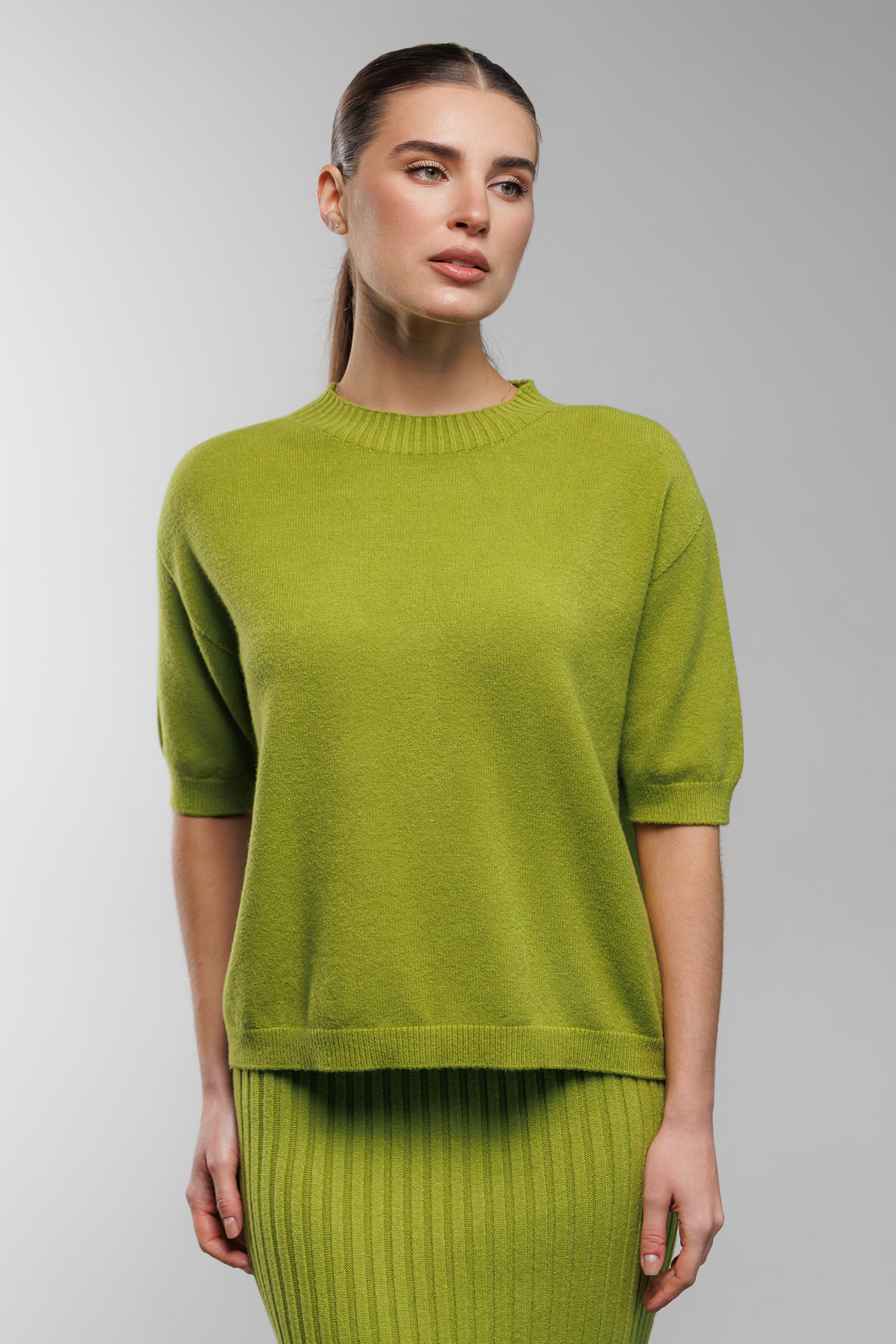Knitted suit with ribbed skirt and olive T-shirt